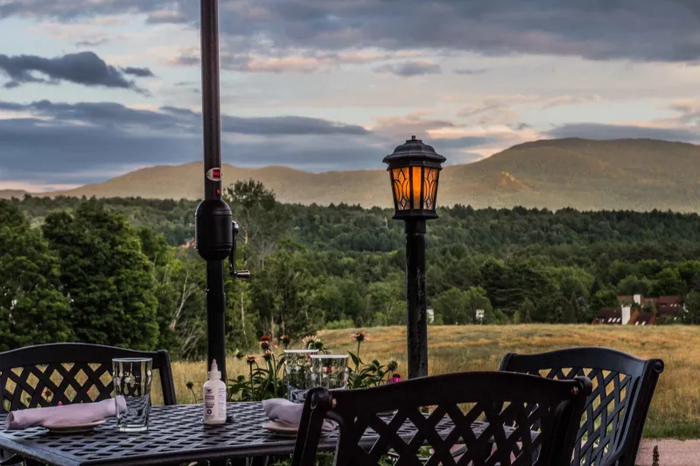 Outdoor table at a restaurant with a view of the mountains 